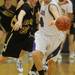 Pioneer junior Aedan York reaches after a turnover during the second half against Dexter during a district match up at Pioneer on Wednesday. Melanie Maxwell I AnnArbor.com